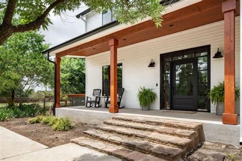 Check Out This Modern Farmhouse Style Front Porch With Natural Stone