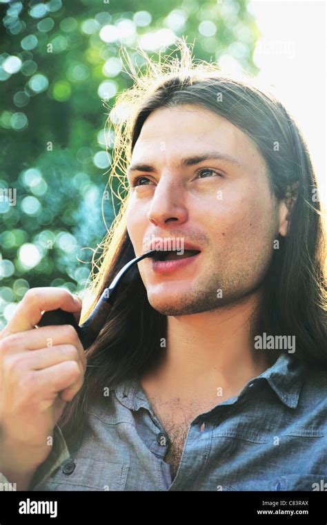 Man Smoking Pipe Outdoors Stock Photo Alamy