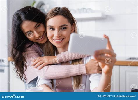Happy Lesbian Couple Taking Selfie On Stock Image Image Of Cellphone Joyful 216519517