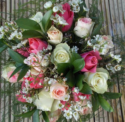 Wonderful Roses And Wax Flower Bouquet A T To Your Door Arranged