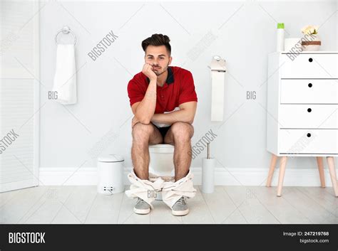 Young Man Sitting On Image And Photo Free Trial Bigstock