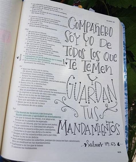 An Open Bible With The Words Written In Spanish And Latin On It