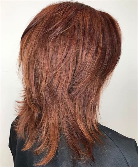wispy layered hairstyle in spicy color modern shag haircut shag haircut shag hairstyles