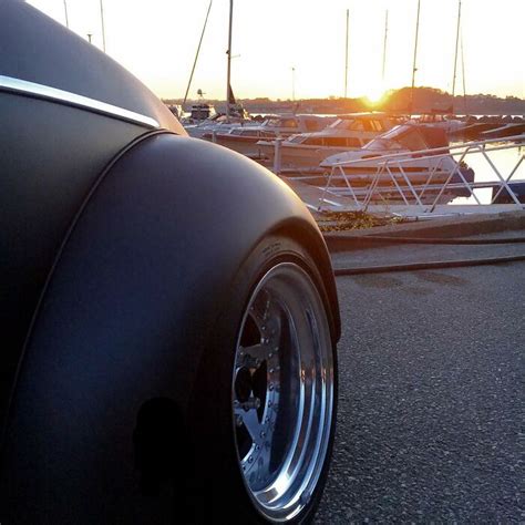 1961 VW Beetle Gets Turned Into A Stylish Black Matte Roadster By