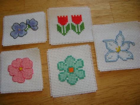 This small cross stitch pattern is very suitable for making a biscornu or a greeting card if you add your own text in the middle of the design.create and have fun! cross stitch flower magnets | Cross stitch flowers, Cross ...
