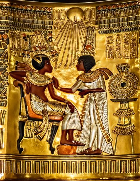 Closeup Of One Of King Tutankhamuns Golden Throne Chairs With Image Of The Pharaoh And His Wife