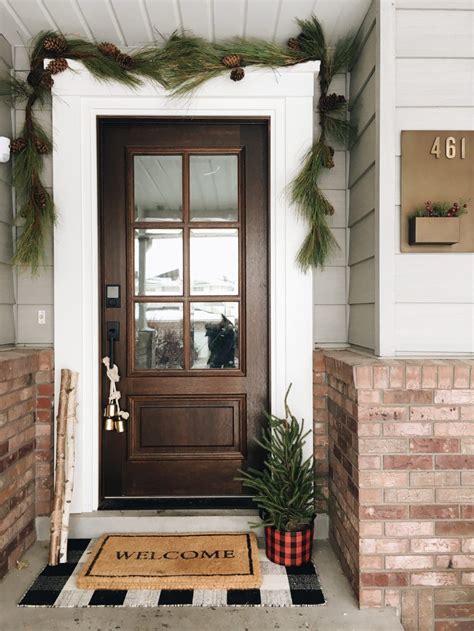 A glass door looks great from the street, and it rules when it comes to providing extra natural light inside. Christmas Around the House - Chris Loves Julia