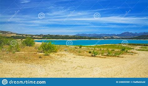 Beautiful Calm Blue Turquoise Mountain Swimming Lake Empty Sand Beach