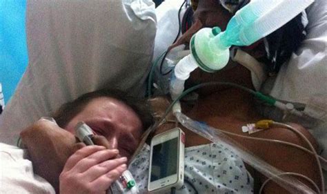 Heartbreaking Photo Shows Wife Cradling Dying Husband After Six Hour