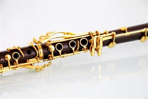 Professional Musical Woodwind Instrument 106g Ebony Wood Body 18k Gold Plated 18 Keys Bb Tone ...