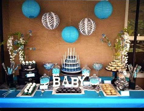 Fresh white flowers and baby's breath surround nautical baby showers are a popular trend for boys, and this adorable baby whale theme is a fun. Boy baby shower dessert table display | Baby showers ...