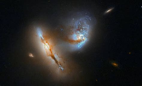 Hubble Presents Ugc 2369 Strange Luminescent Pair Of Galaxies Full Of
