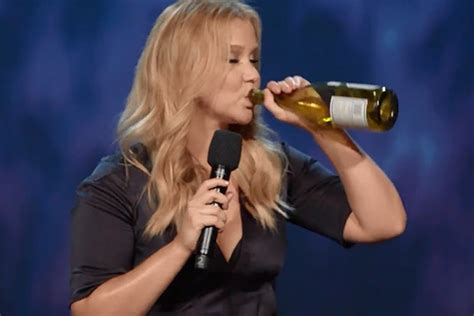 Amy Schumer Swigs Wine Pokes Fun At Trainwreck In New Trailer For