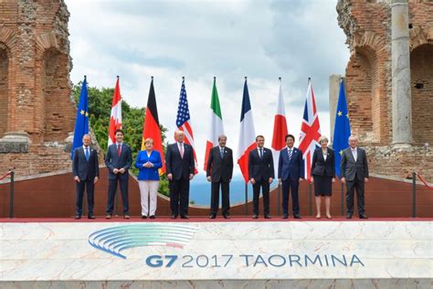 Boris johnson today urged g7 leaders to aim for a more 'feminine' and 'gender neutral' recovery from coronavirus in a bizarre opening speech. G7_Taormina_family_photo_2017-05-26 - Affarinternazionali