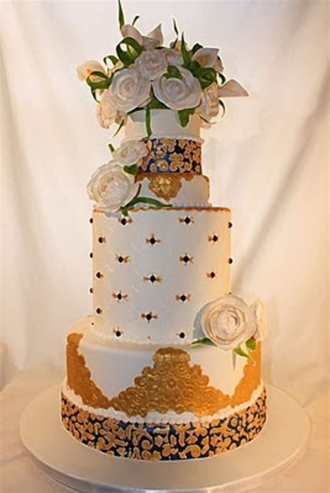 Elegant Royal Blue And Gold Wedding Cake