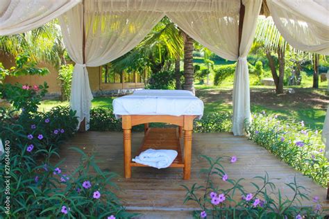 Spa Massage Room At Beachside In Bungalow Massage Tables With Towels Beauty Care Concept Spa