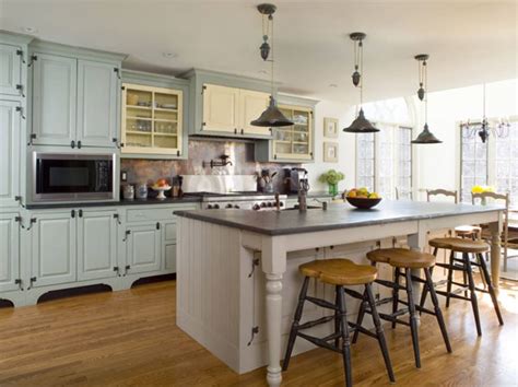 Paint the kitchen island a different color than the rest so it looks like an antique piece of furniture in weather green or gold. French Country Paint Colors - Interior Decorating Colors ...
