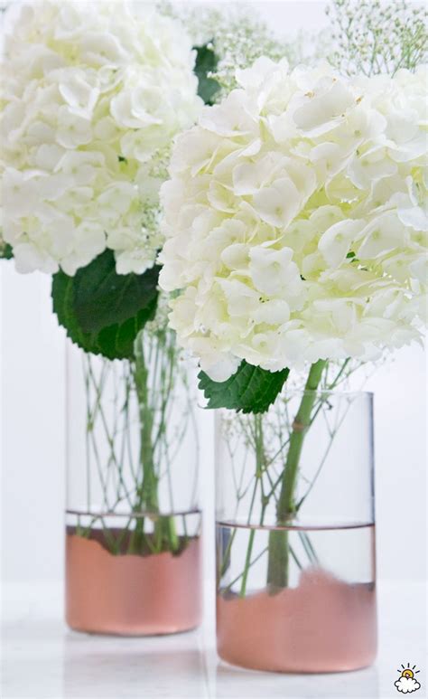These diy wedding centerpieces are beautiful and easy to make. Tape Old Newspaper To A Cheap Vase To Make Gorgeous Rose ...