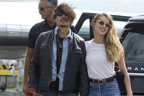 Johnny Depp And Amber Heard Hold Hands For Australian Arrival Amber Heard Johnny Depp Just Jared