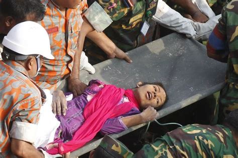 Bangladesh Factory Collapse Watch Moment Woman Is Pulled Alive From