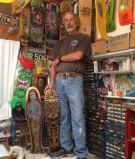 Jim Phillips In His Studio With His Skateboard Artwork Around Him