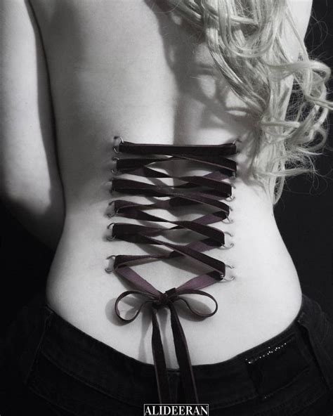As paul unrolled the new corset, he could see it was stiffened with broad, steel stays. Pin by Andrea Romero on Piercings I want/need | Corset ...