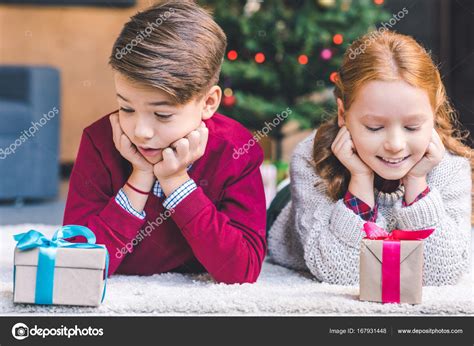 Brother And Sister With Christmas Ts — Stock Photo © Allaserebrina