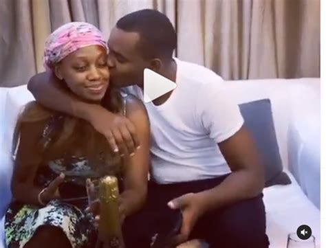 NBS TV News Anchor Canary Mugume Shows Off Romantic Side As His Captured Swapping Saliva With