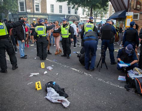 Police At The Scene Of A Stabbing At Notting Hill Carnival London 28