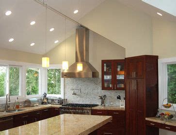 There are many other ideas for vaulted ceiling lighting such as cable lighting, spotlights, and monorail lighting. Track Lighting for Vaulted Ceilings | Great Room Vaulted ...