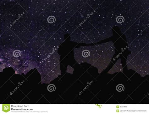 Silhouette Of Couple Holding Hands Beneath The Stars Milky Way And A