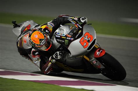 qatar motogp rabat battles to moto2 win