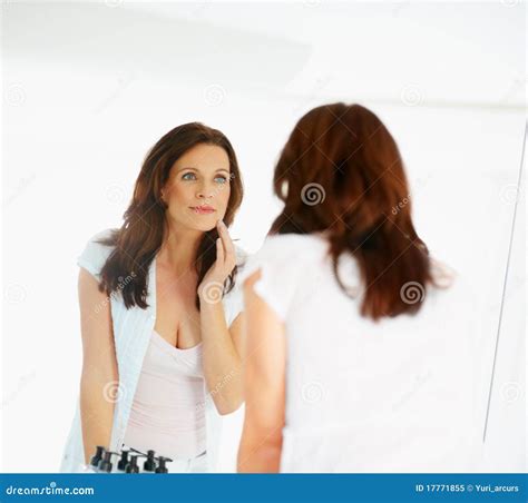 Portrait Of Pretty Woman Stroking Her Face Stock Image Image Of Care Aged