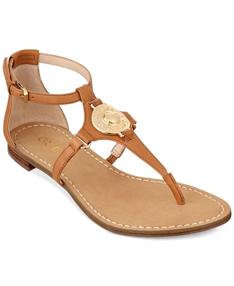 Lyst Guess Womens Rafiya T Strap Flat Sandals In Brown