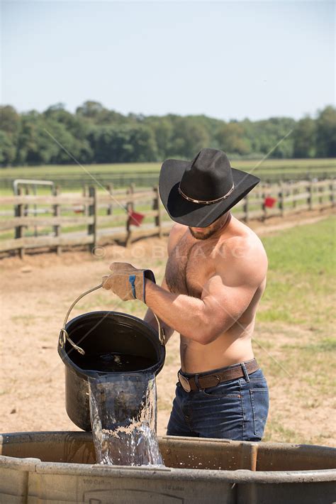 Working Shirtless Cowboy On A Ranch Rob Lang Images