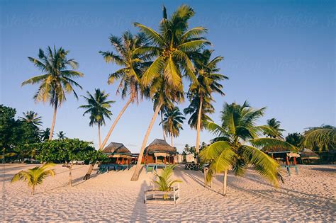 Beach Huts Bungalows On A Resort On Beach Of Exotic Tropical Island By Stocksy Contributor