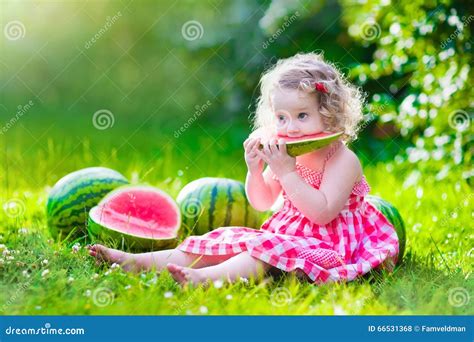 Little Girl Eating Watermelon Stock Photography