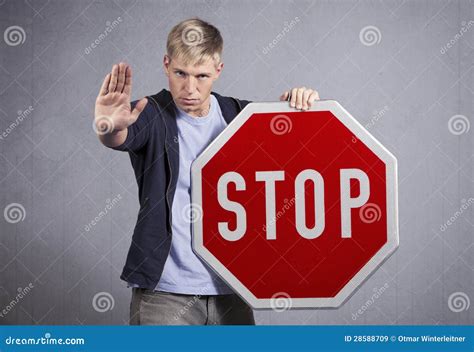 Man Showing Stop Sign To Annoyed Wife Who Constantly Screaming And