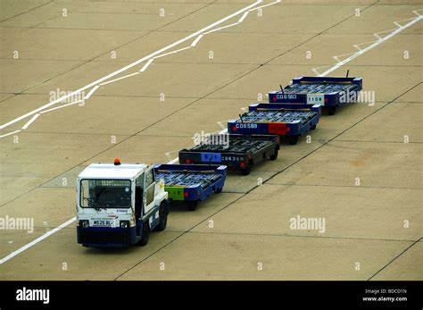 Baggage Truck At Gatwick Airport Uk Stock Photo Royalty Free Image