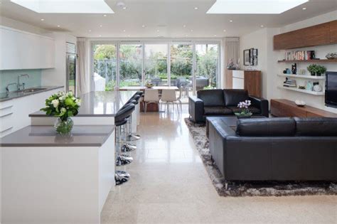 Open plan living spaces come in many different combinations. Stunning open plan kitchen and living area in London by ...