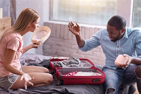 Young Couple Arguing And Preparing For Vacation Stock Image Image Of