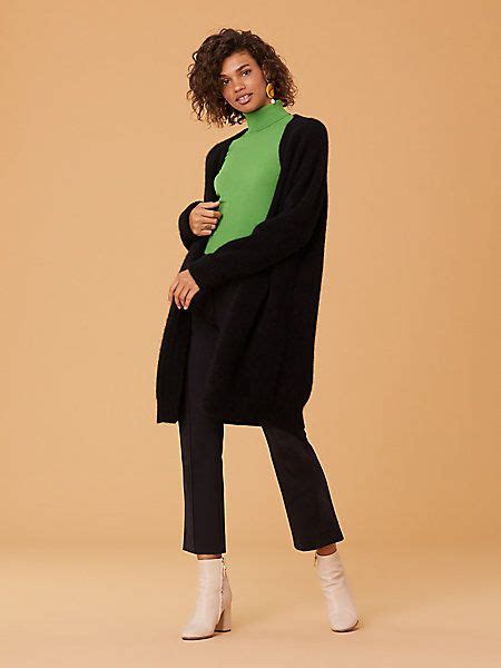Oversized And Soft To The Touch This Black Cardigan Feels Impossible