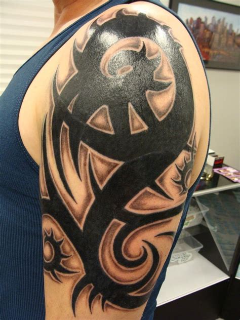 In fact, you really can't go wrong getting arm tattoos for men. Best Tribal Arm Tattoo Designs for Men - The Xerxes
