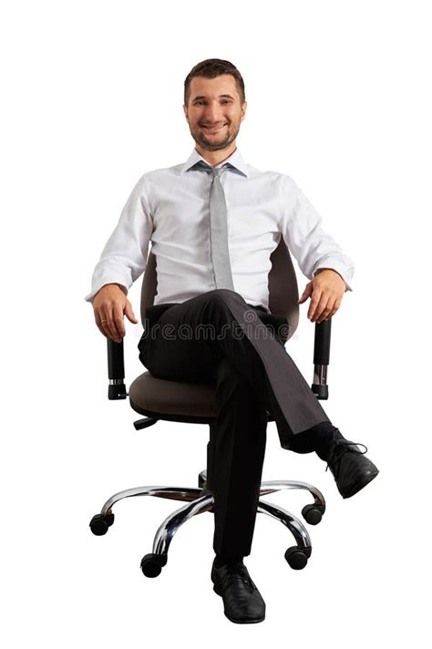 Man Sitting On Office Chair And Smiling Stock Photo Image Of Young