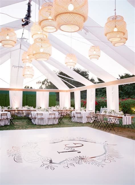 All White Tented Wedding Reception With Hanging Wicker Installations At