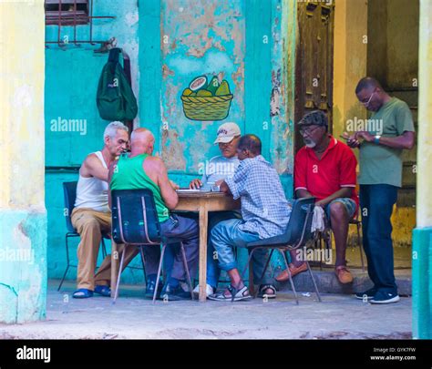 Havana Cuba July 18 Unidentified Men Play Dominos On The Street