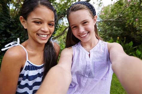 Best Friends Forever Two Young Girl Friends Taking A Selfie Together