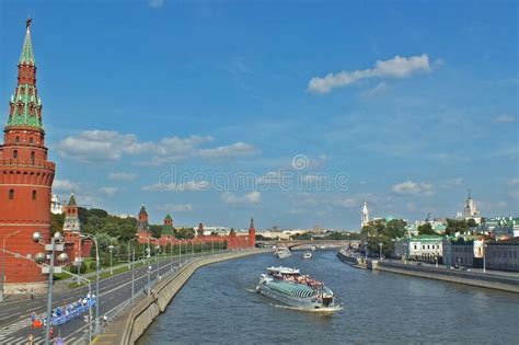 Panoramic View Of The Kremlin Wall And Moskva River With Boat Moscow
