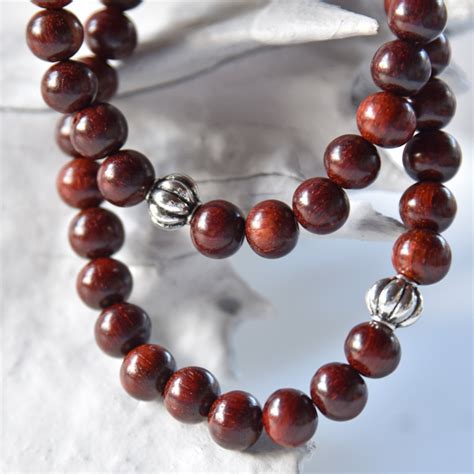sandalwood mala for meditation practice with traditional 108 beads