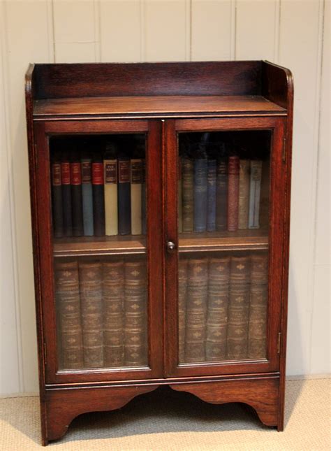 Includes two adjustable shelves and two doors. Small Oak Two Door Bookcase - Antiques Atlas